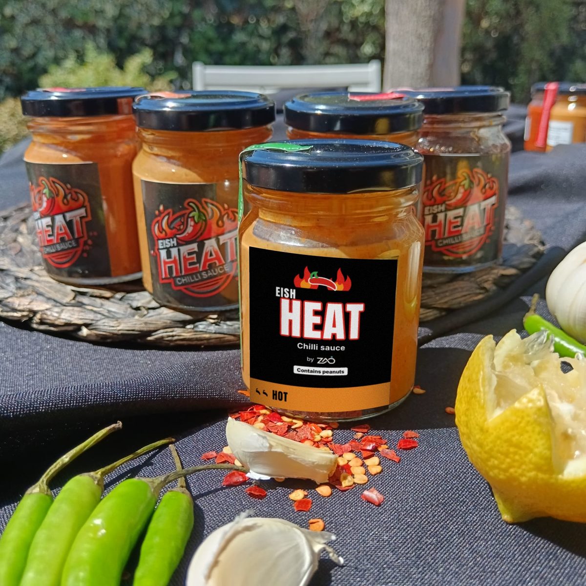 A jar of Eish Heat chilli sauce with green chillies, garlic, lemon and chilli flakes